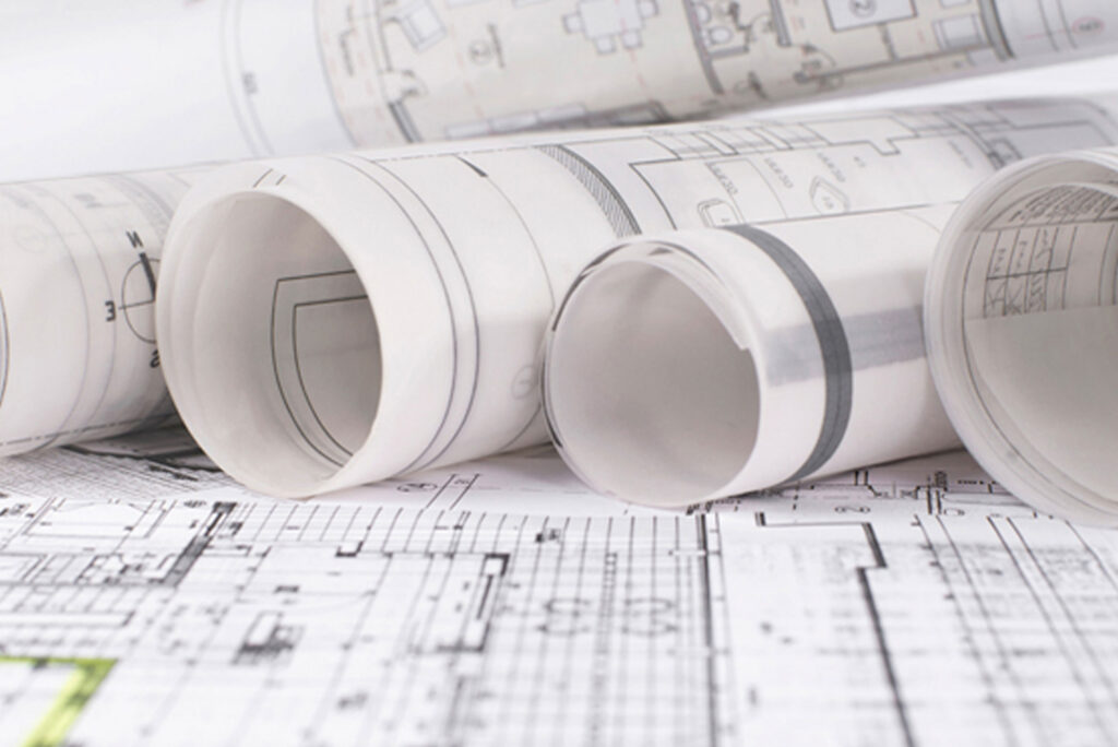 Architctural drawings roll up into scrolls
