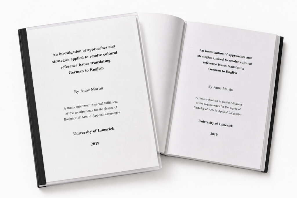 A heat bound A4 thesis with a black back and clear PVC cover