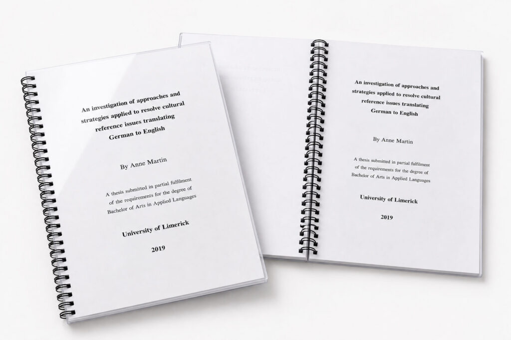 A wire bound A4 thesis with a black back and clear PVC cover